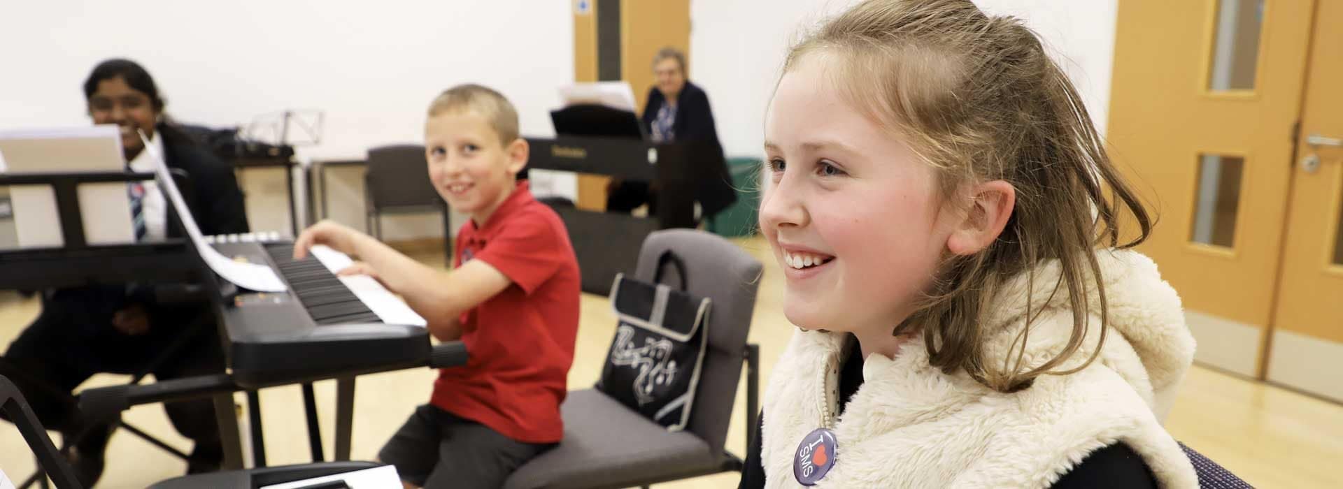 Children enjoying Orchestra