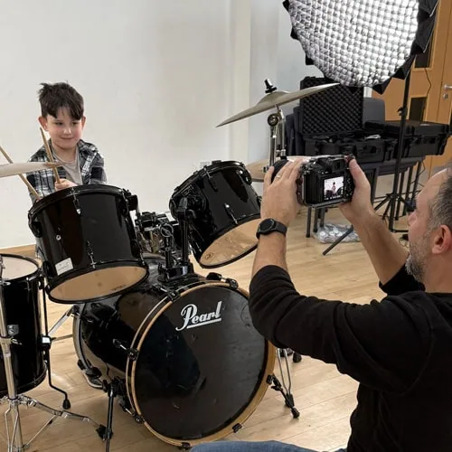 boy playing the drums