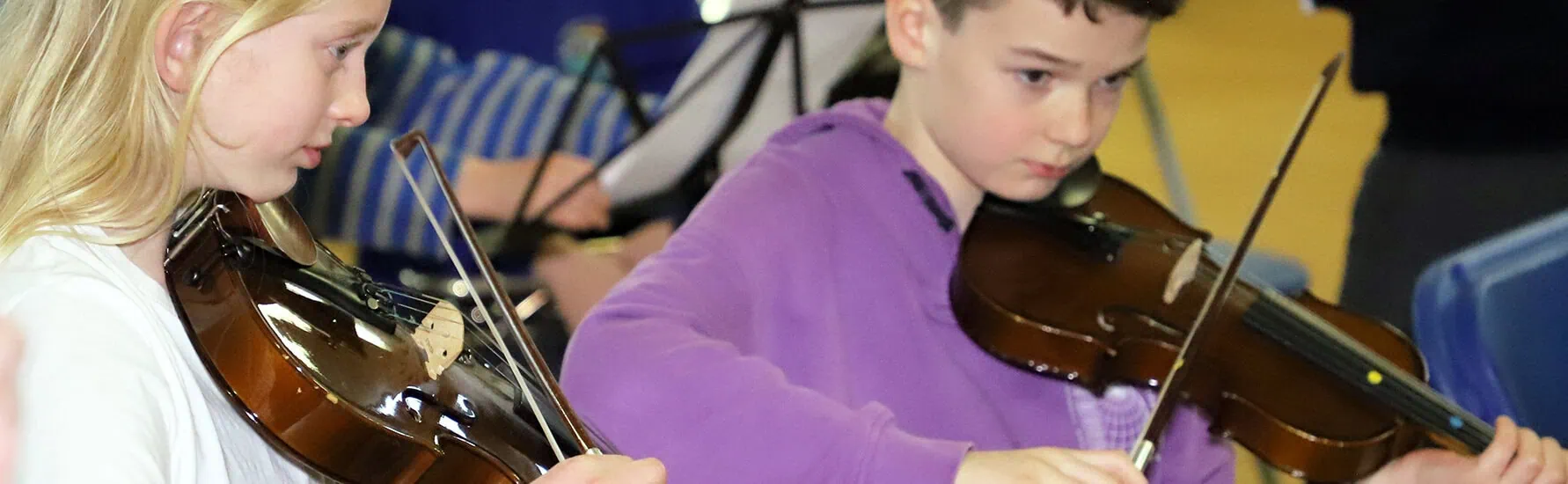 childrem getting started to play music